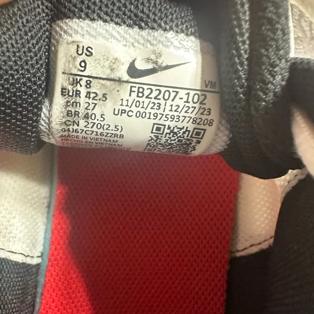 Nike Black‎ and White Sneakers with Red Swoosh